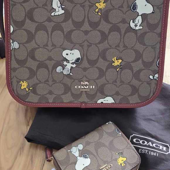 Coach Handbags - Coach Crossbody Snoopy and Woodstock on this beautiful brown leather bag